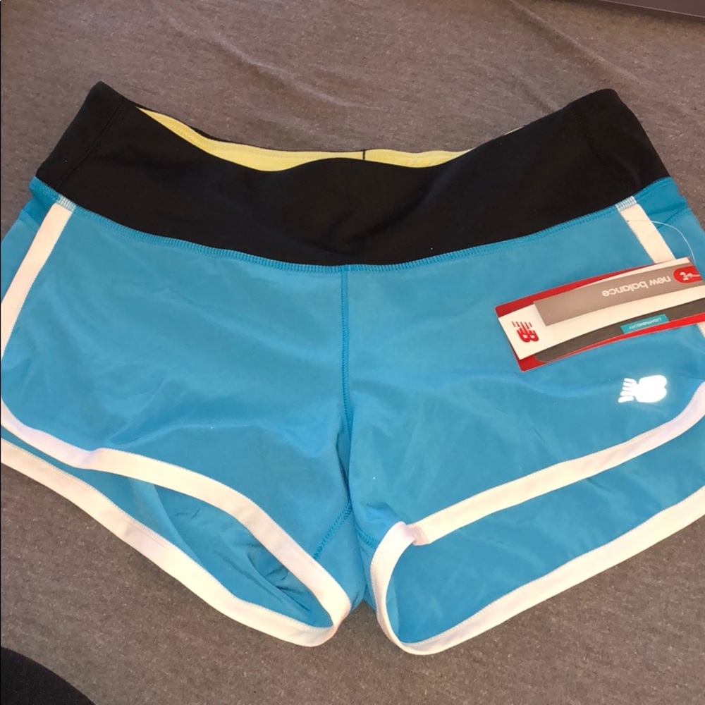 Never worn, tags still on new balance shorts